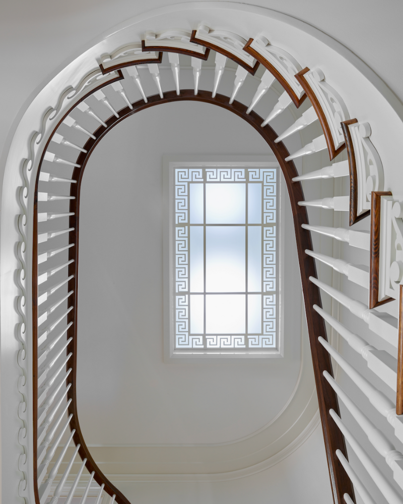 staircase and ceiling in a traditional isle of hope georgia home