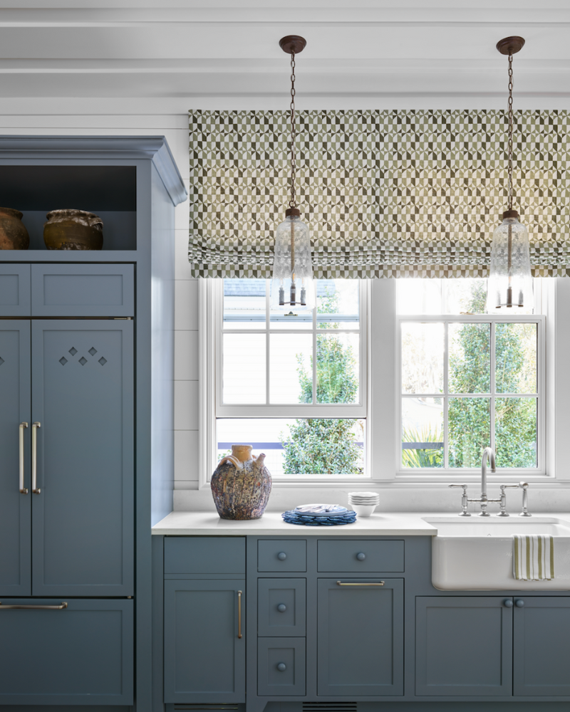 pool house kitchen with blue cabinets