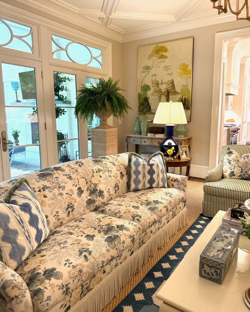 classic raleigh home with blue floral couch