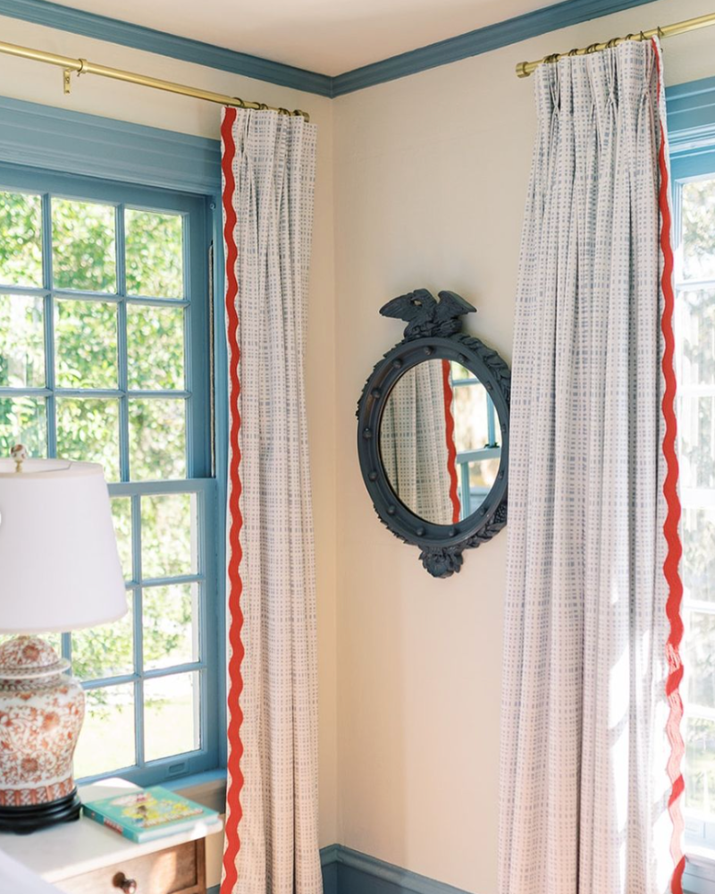 white dove in a bedroom with blue trim