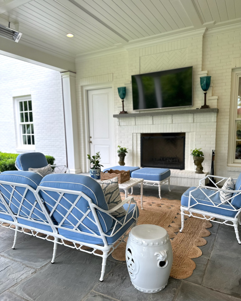 classic raleigh home blue and white patio furniture and outdoor fireplace