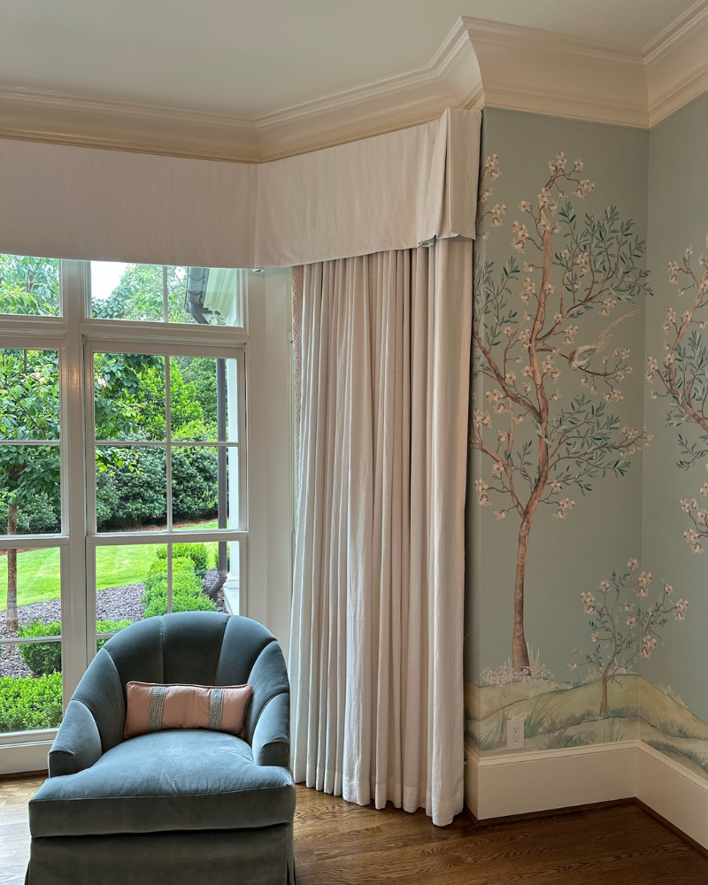 classic raleigh home with blue, white and pink primary suite