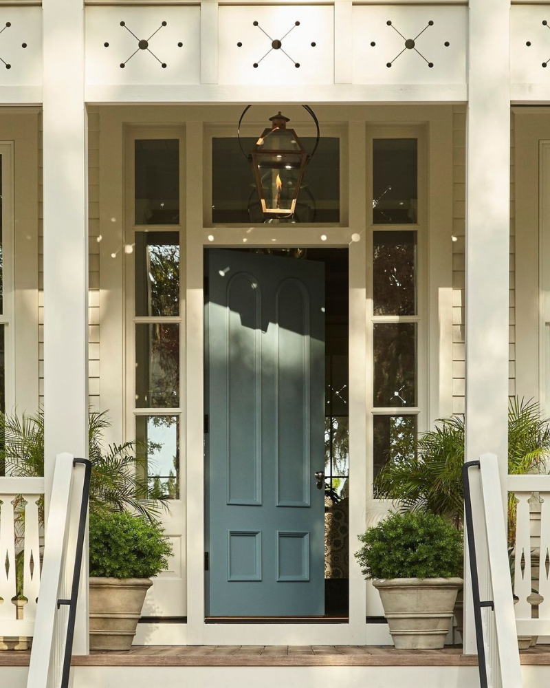 2019 southern living showhouse antique front door painted in Sherwin-Williams' Blustery Sky (SW 9140).