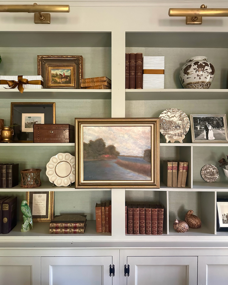 classic built-in book shelf styled with personal touches including fresh artwork for the holidays